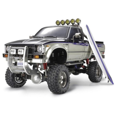 Tamiya Toyota Hilux High-Lift Electric 4X4 Scale Truck Kit w/3-Speed & Surfboard Tamiya Toyota Hilux High-Lift Electric 4X4 Scale Truck Kit w/3-Speed & Surfboard
